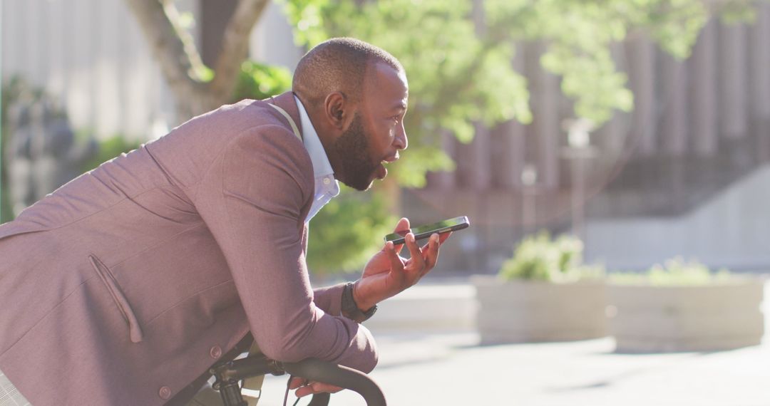Tech-Savvy Man Active in Urban Environment with Bicycle