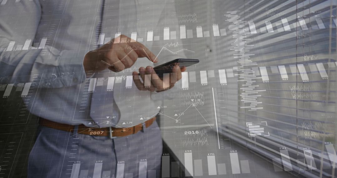 Businessman Interacting with Smartphone and Data Analytics Overlay