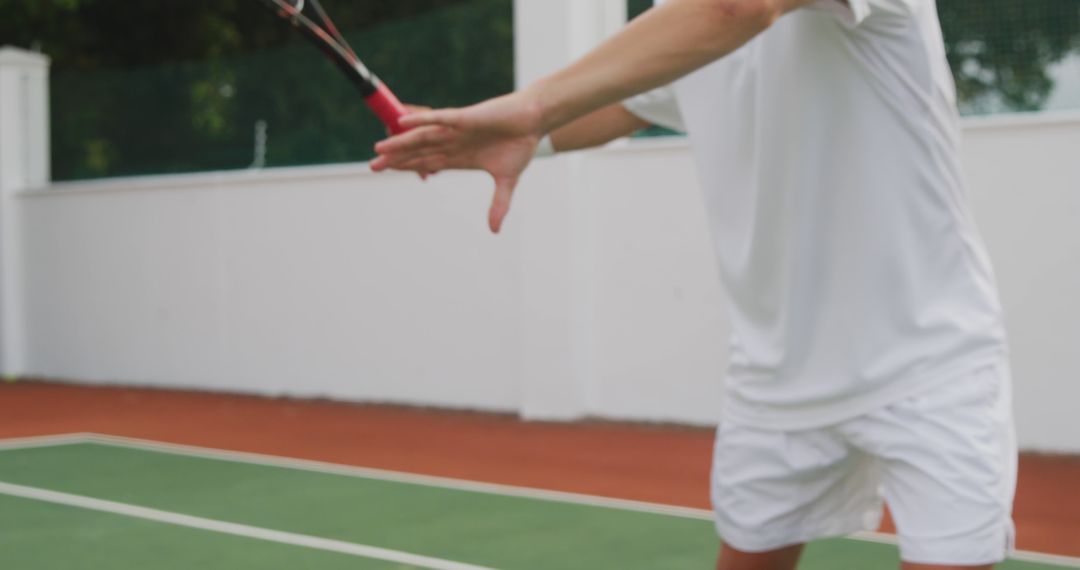 Tennis Player Practicing Forehand Swing on Outdoor Court - Free Images, Stock Photos and Pictures on Pikwizard.com