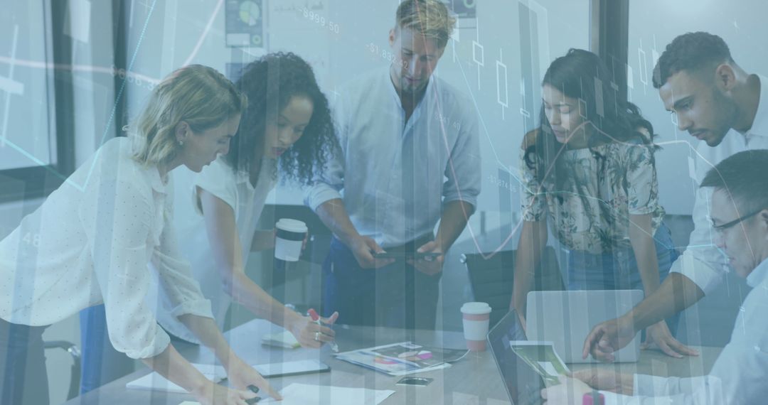 Diverse Team Analyzing Data in Business Meeting