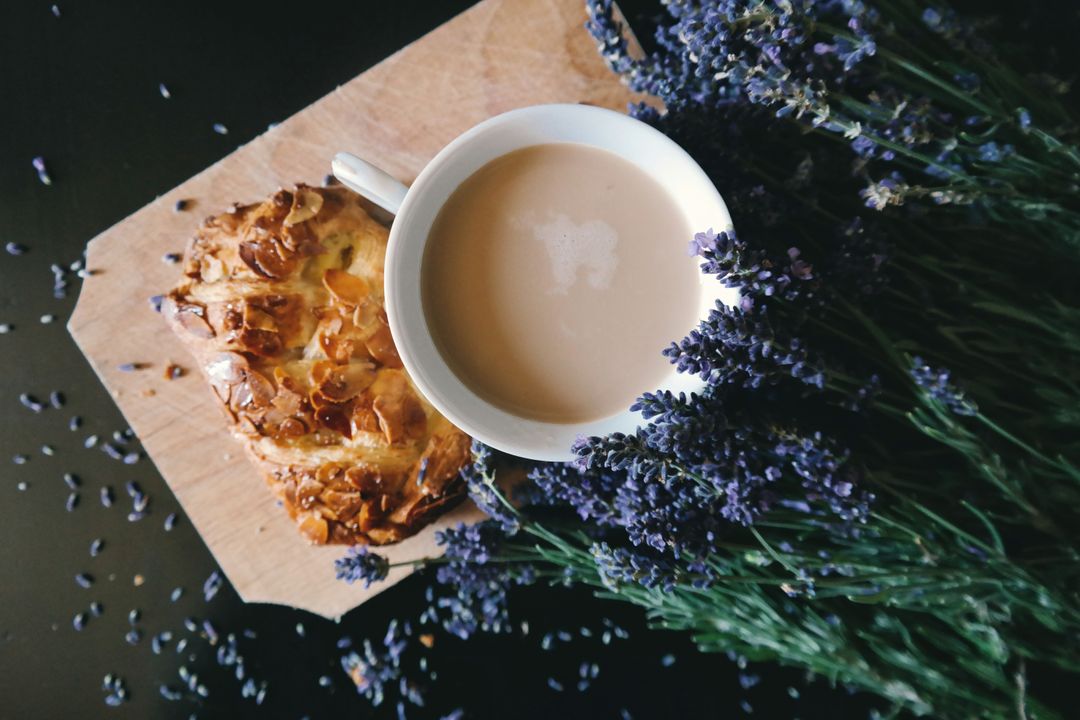 Cup of Latte with Almond Croissant and Lavender Flowers - Free Images, Stock Photos and Pictures on Pikwizard.com