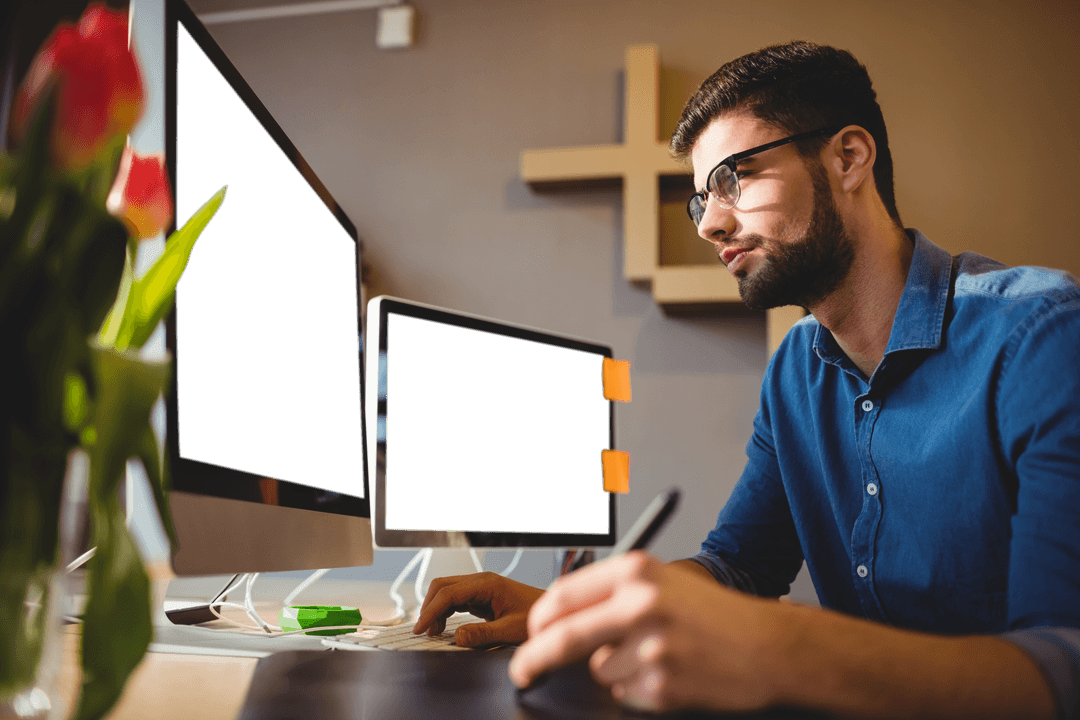 Focused Designer Working on Two Model Transparent Displays