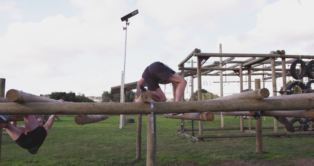 Individuals Training on Outdoor Obstacle Course - Free Images, Stock Photos and Pictures on Pikwizard.com