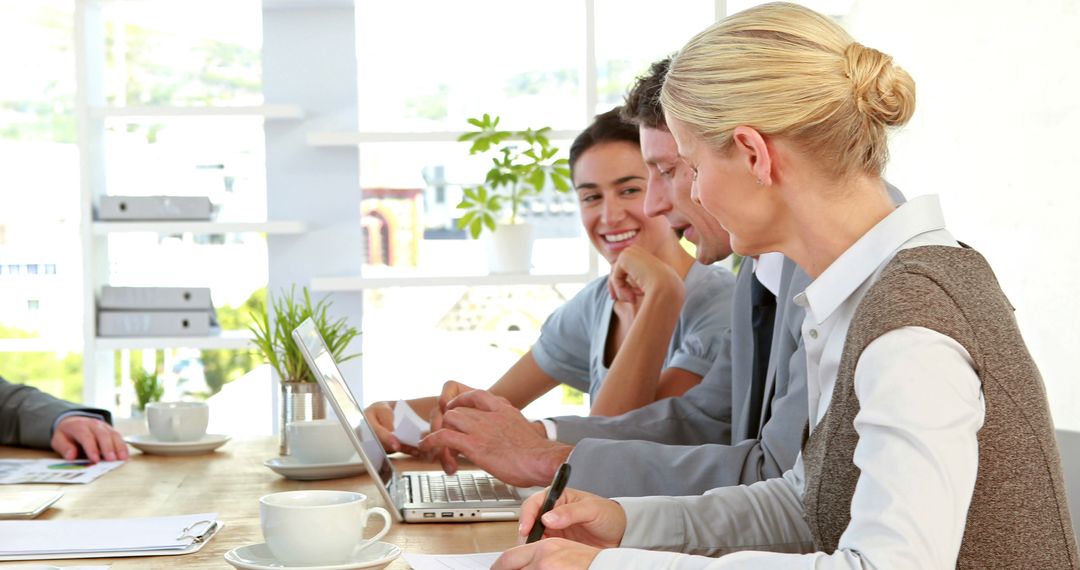 Collaborative Meeting in Bright Office Environment