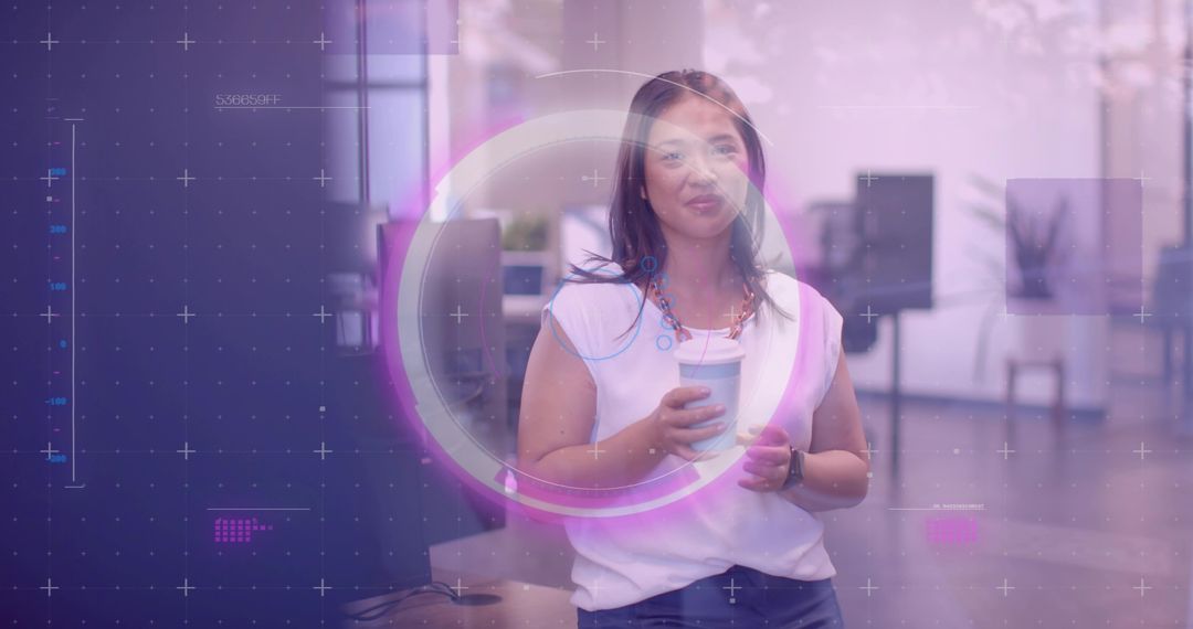 Woman with Coffee Embracing Technology in Modern Office Environment