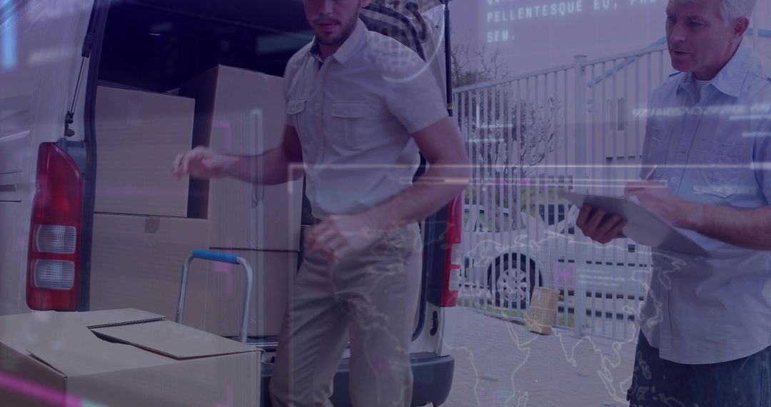 Delivery Personnel Organizing Cardboard Boxes for Transport