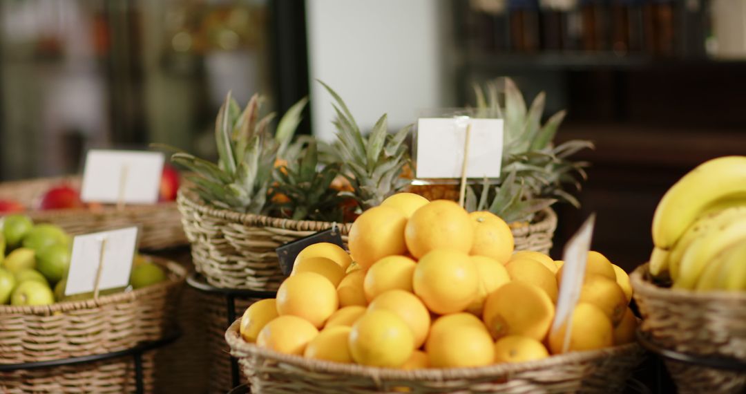 Fresh Lemons and Pineapples in Baskets at Market - Free Images, Stock Photos and Pictures on Pikwizard.com