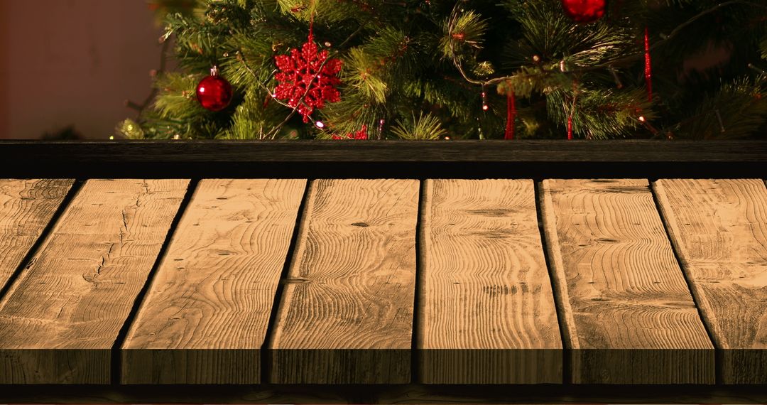 Wooden Surface in Front of Christmas Tree with Decorations