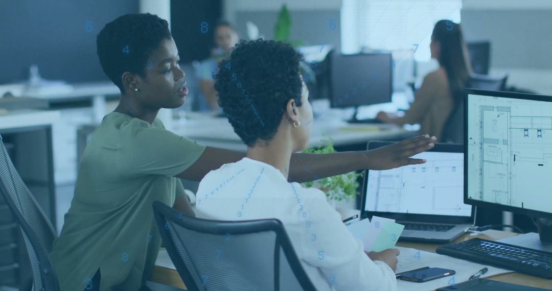 Colleagues Discussing Planning in Shared Office