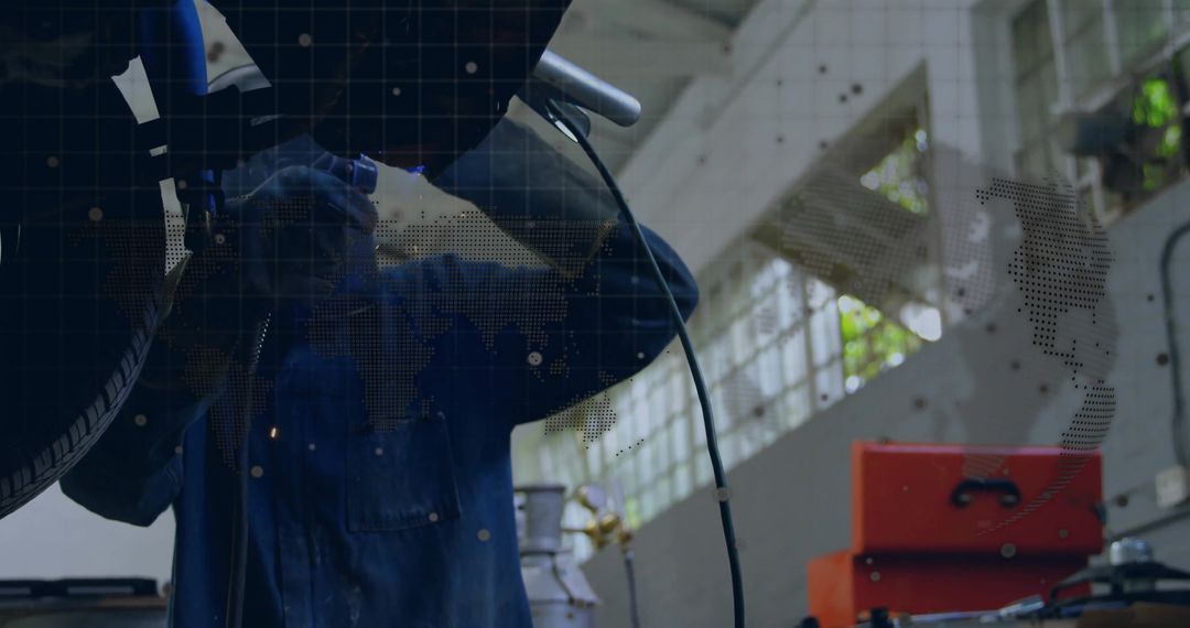 Mechanic Welding Undercarriage in Workshop with Toolkit and Spark