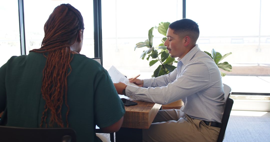 Collaborative Discussion in Modern Office Setting