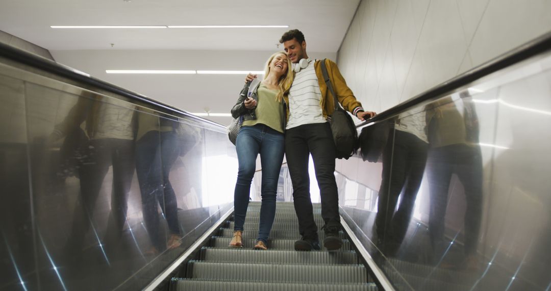 Happy Couple Entering Subway Station Using Escalator - Free Images, Stock Photos and Pictures on Pikwizard.com