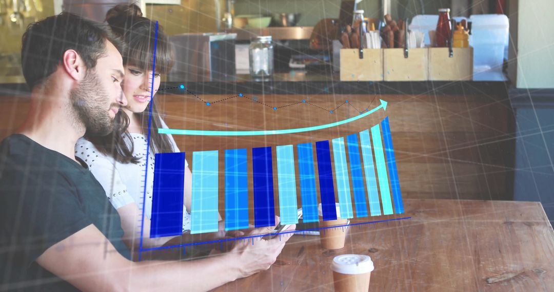 Couple Analyzing Financial Data with Smartphone and Coffee