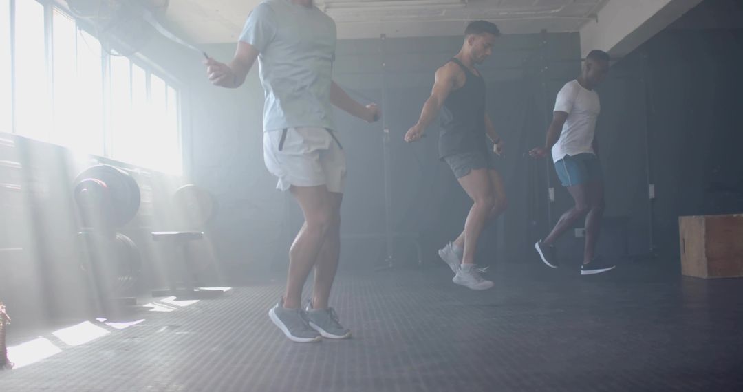 Group Exercise with Jump Ropes in Modern Gym Atmosphere