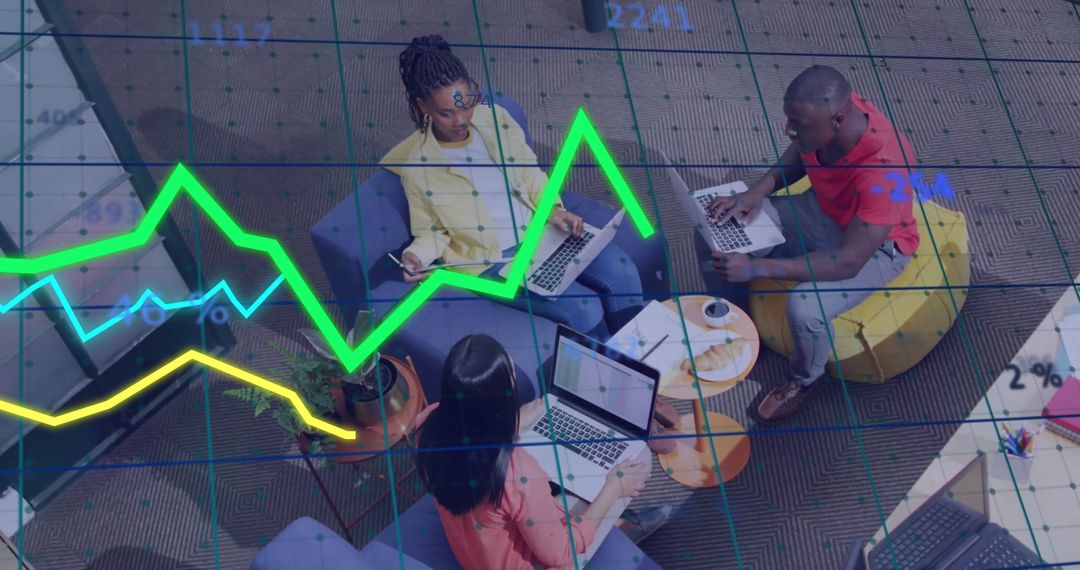 Diverse Team Analyzing Financial Data with Digital Chart Overlay