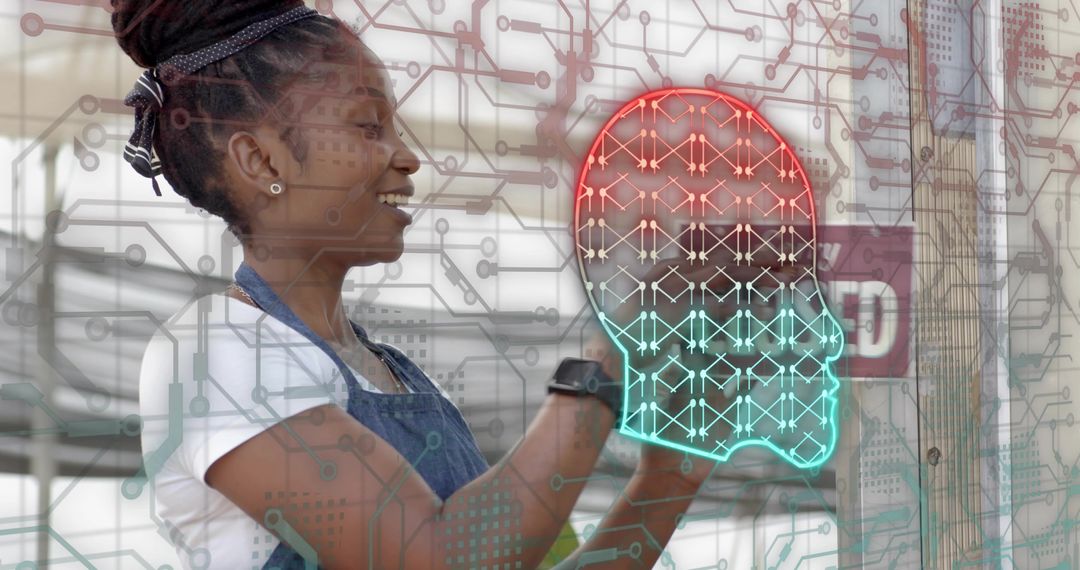 Woman Maker Interacting with Neon Brain Circuit Interface on Transparent Panel