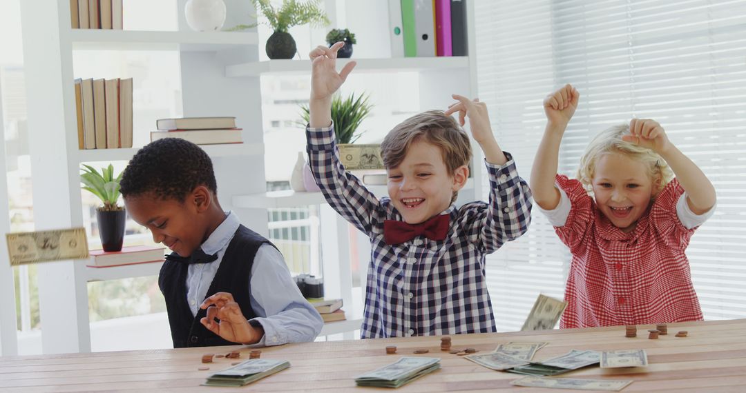 Diverse Group of Happy Children Counting Money at Table - Free Images, Stock Photos and Pictures on Pikwizard.com