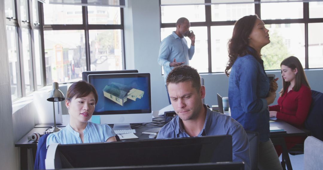 Team in Casual Office Collaborating on Project