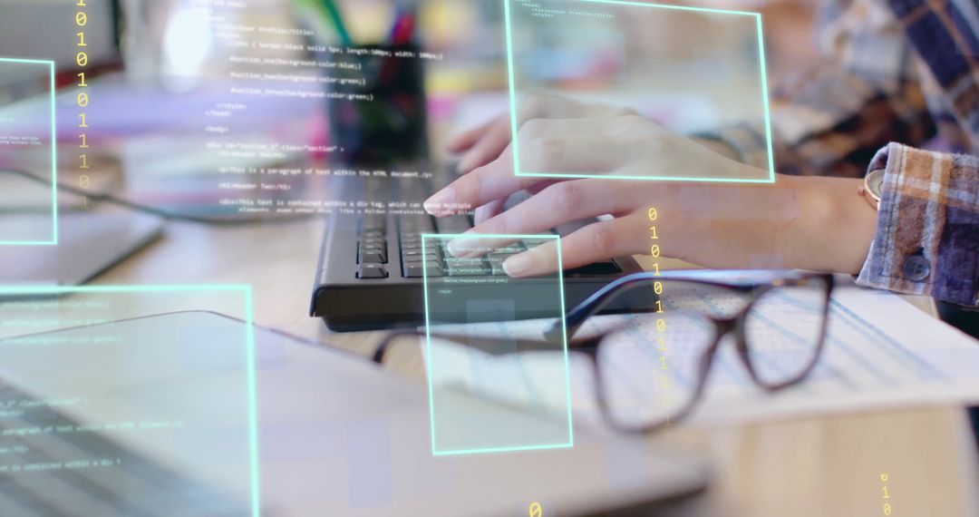 Hands of Businesswoman Typing with Digital Data Graphics Overlay
