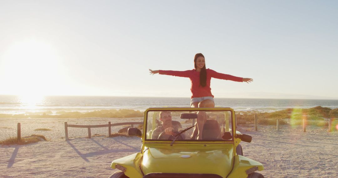 Young Woman Enjoying Beach Sunset on Off-Road Vehicle - Free Images, Stock Photos and Pictures on Pikwizard.com