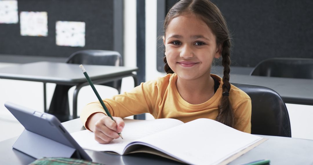 Young Girl Engaged with Homework in Classroom Setting
