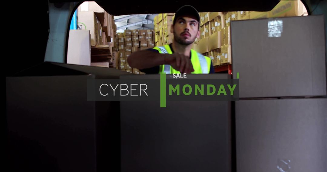 Warehouse Worker Loading Boxes with Cyber Monday Sale Text