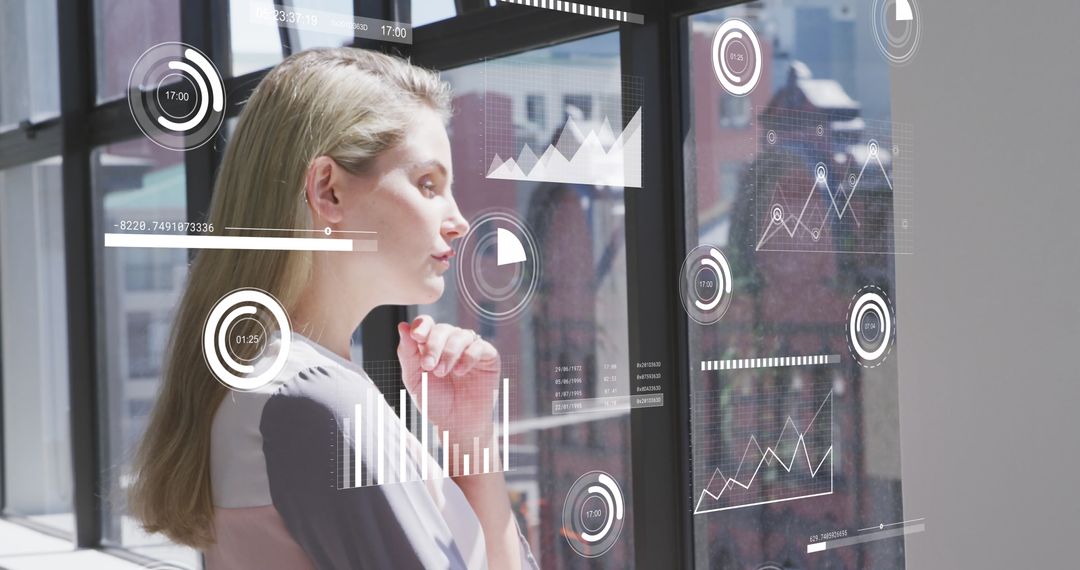 Businesswoman Analyzing Digital Data with Futuristic Interface