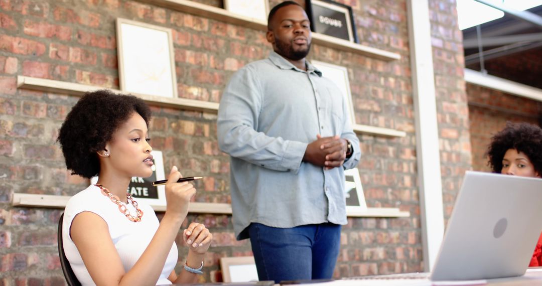 Team Collaboration: Diverse Professionals Engaging in Creative Brainstorming Session