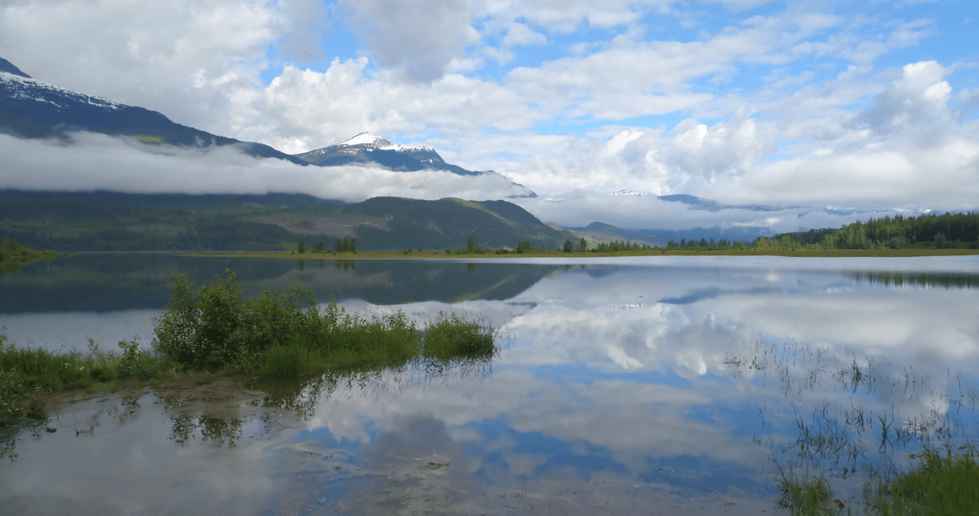 Transparent Calm Lake with Reflection in Stunning Mountain Landscape