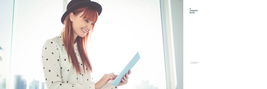 Smiling Businesswoman Using Digital Tablet for Finance Blog