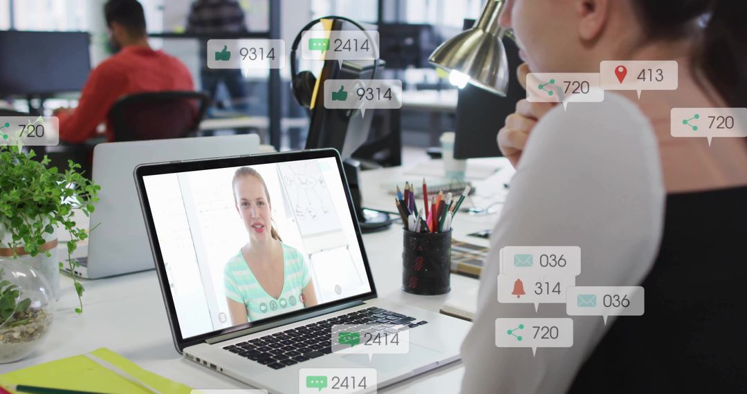 Remote Team Collaborating on Video Call with Social Notifications Overlay in Modern Office