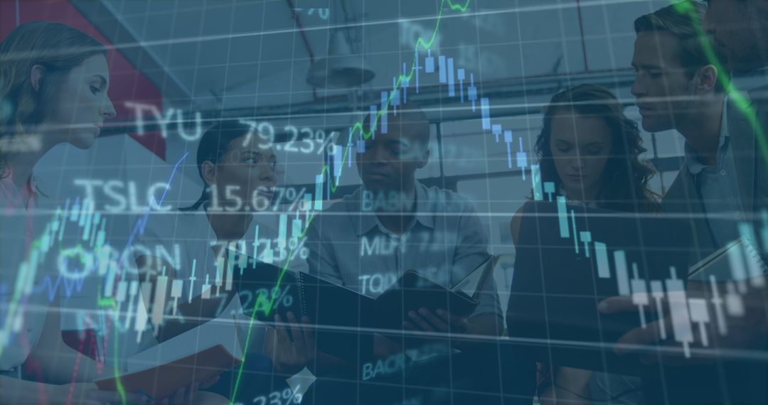 Multicultural Team Analyzing Stock Market Data in Office