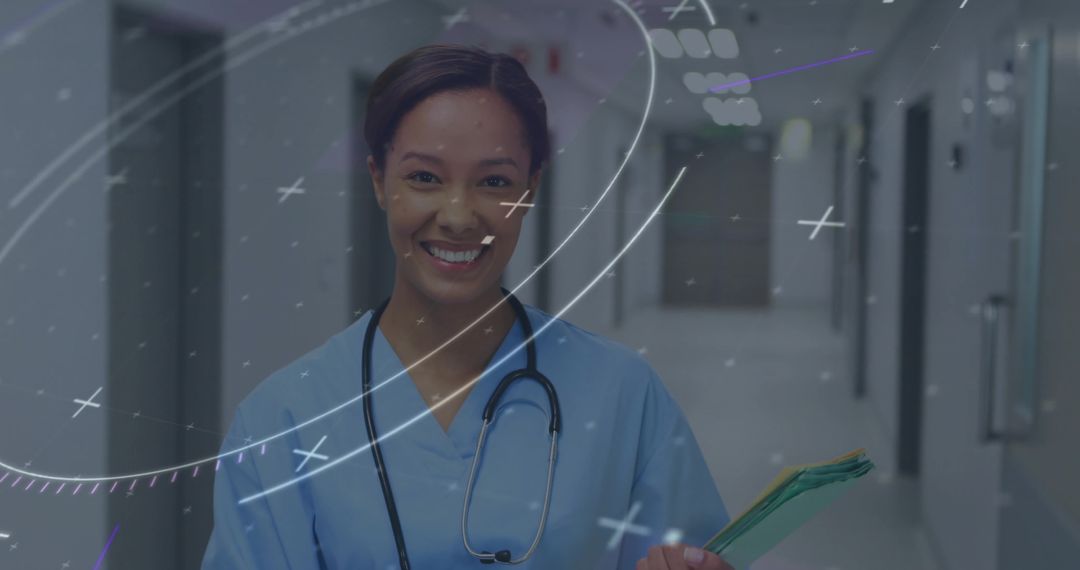 Smiling Nurse Standing in Hospital Corridor Holding Patient Folders