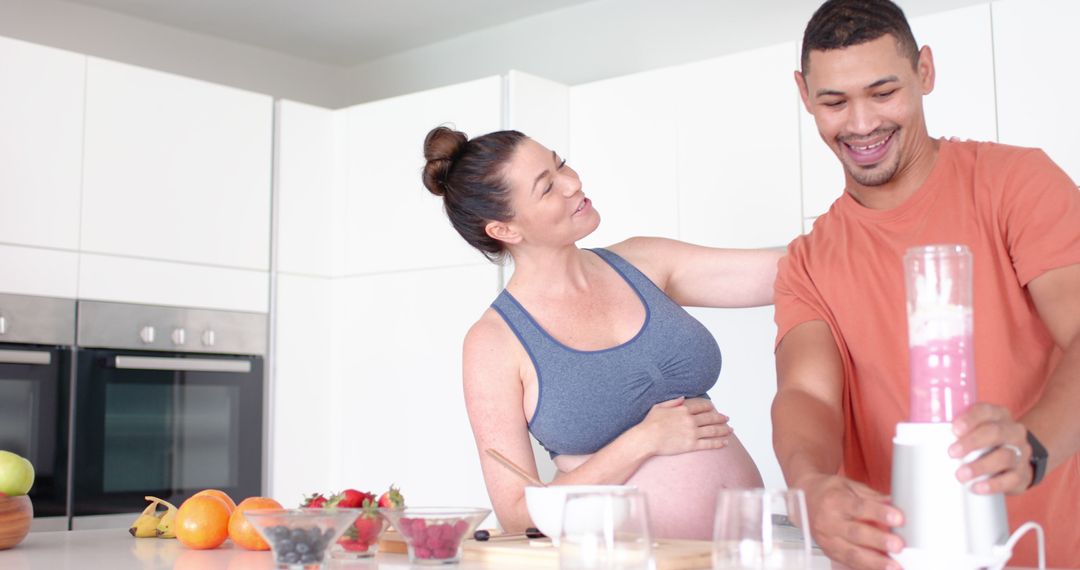 Diverse Couple Making Healthy Smoothie Together in Modern Kitchen
