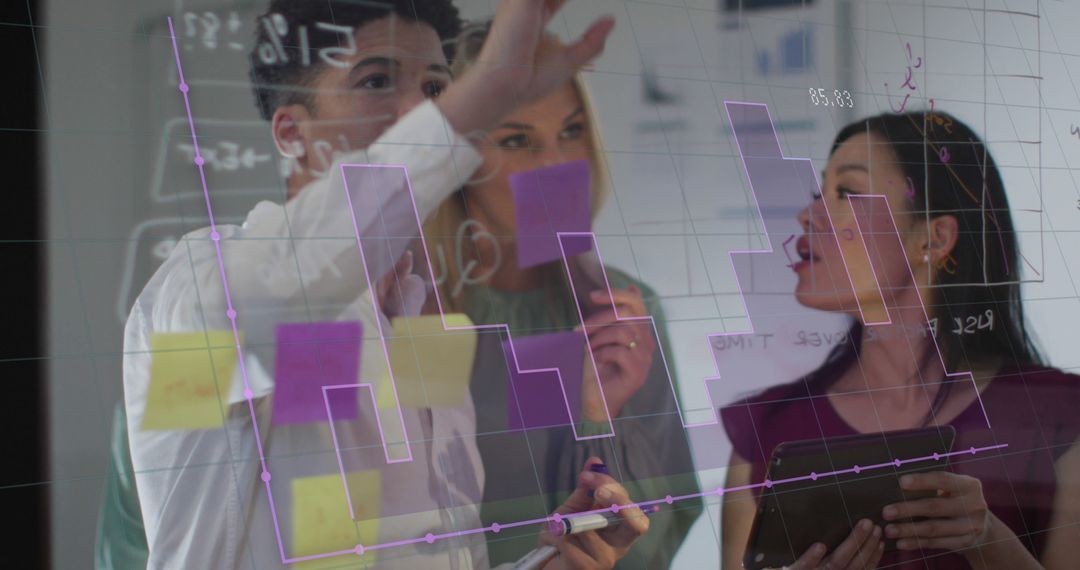 Diverse Business Team Analyzing Financial Data on Digital Screen