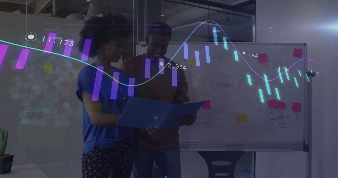 Coworkers Collaborating on Data Analytics in Modern Office Environment