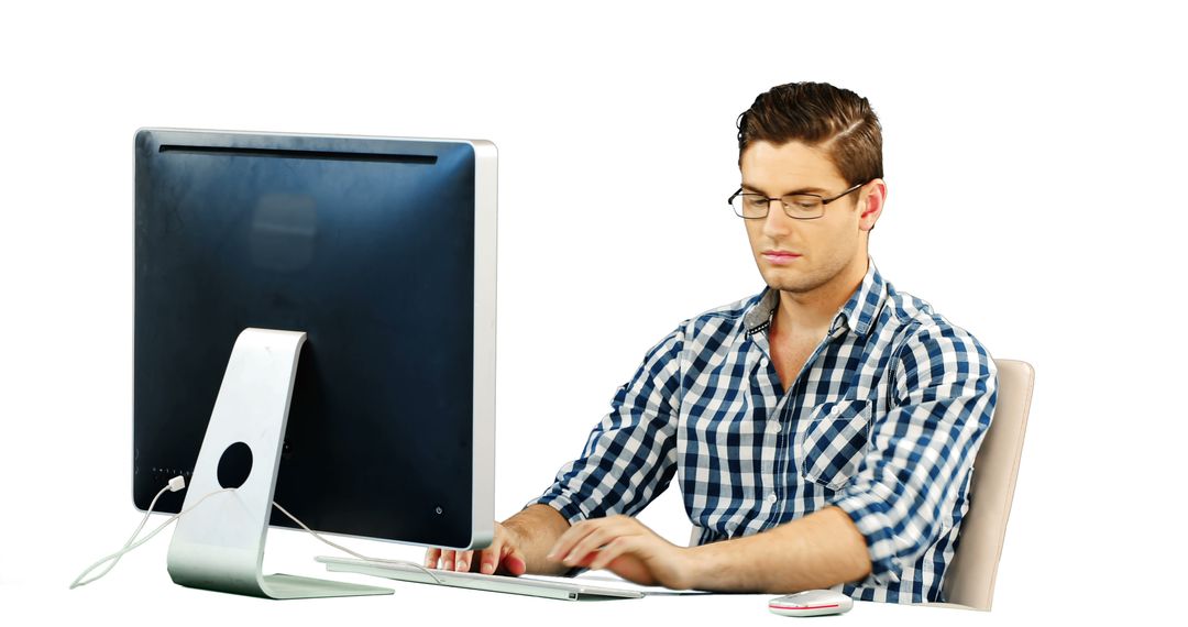 Man working on desktop against white background - Free Images, Stock Photos and Pictures on Pikwizard.com