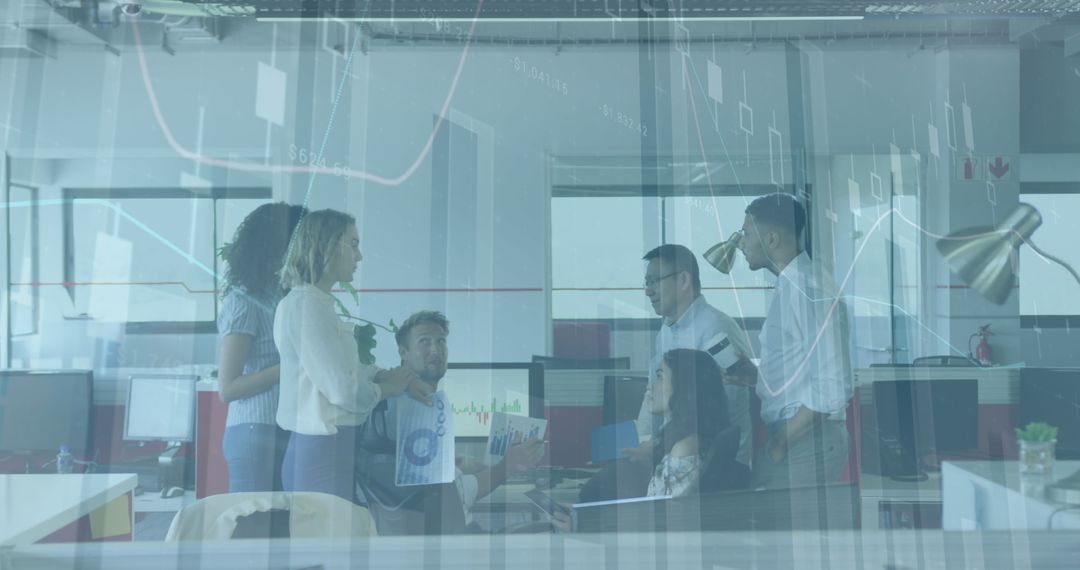 Diverse Business Team Networking in Modern Office Amidst Financial Analytics