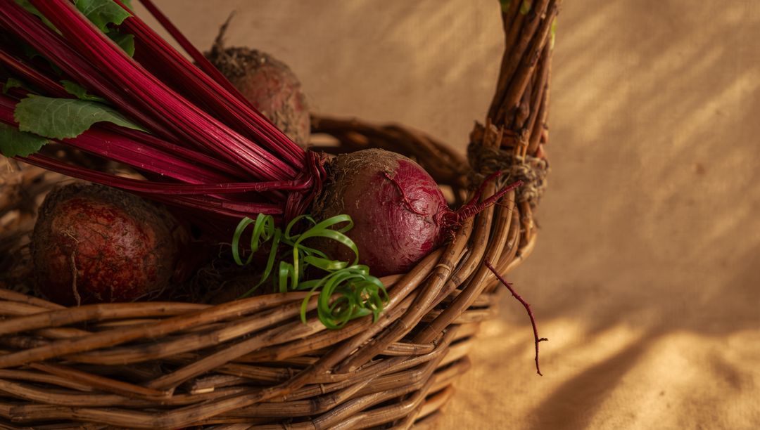Rustic Basket of Fresh Beetroots on Linen Cloth