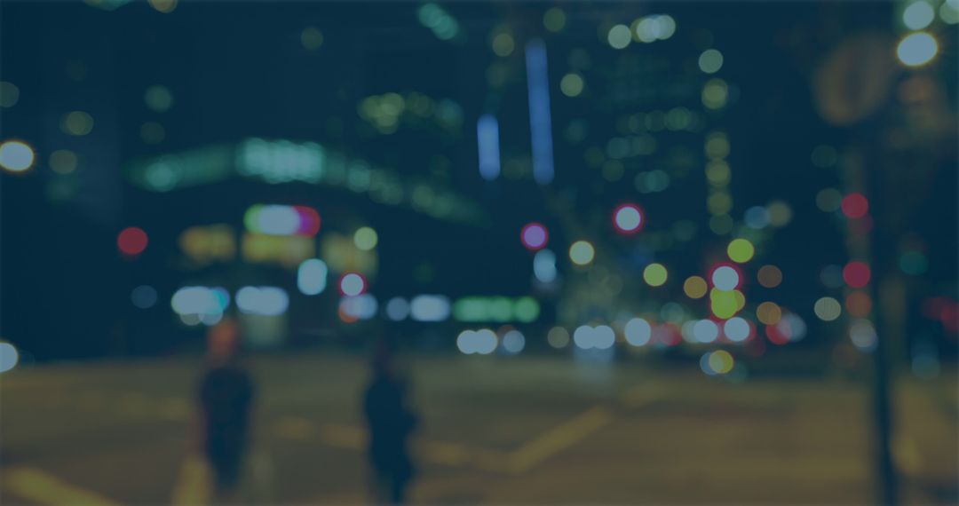 Blurred Cityscape at Night with Colorful Light Bokeh