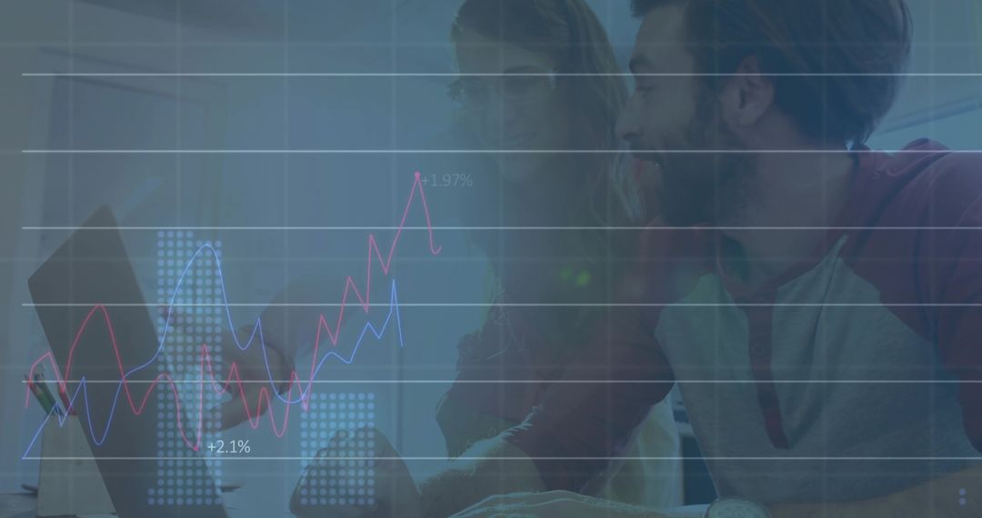 Collaborating Analysts Discussing Data with Line Charts in Modern Office