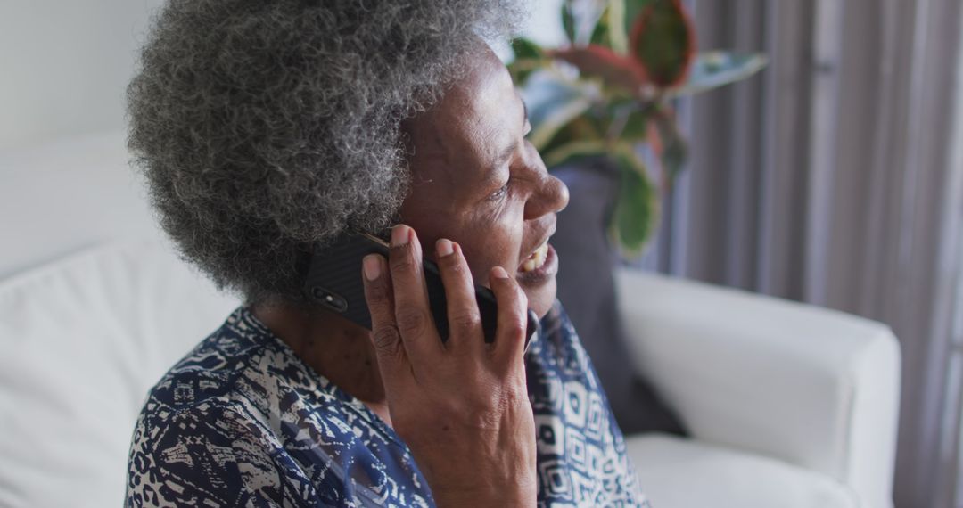 Senior Woman Talking on Phone While Smiling at Home - Free Images, Stock Photos and Pictures on Pikwizard.com