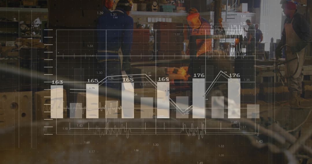 Industry Workers Analyzing Data in Manufacturing Environment