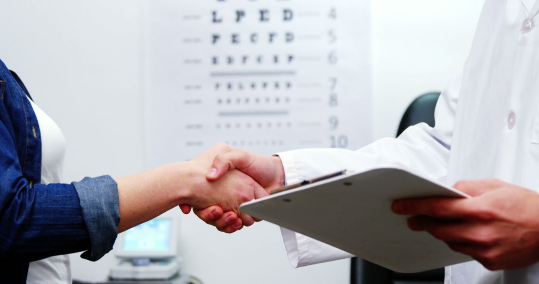 Doctor Shaking Hands with Patient After Medical Exam - Free Images, Stock Photos and Pictures on Pikwizard.com