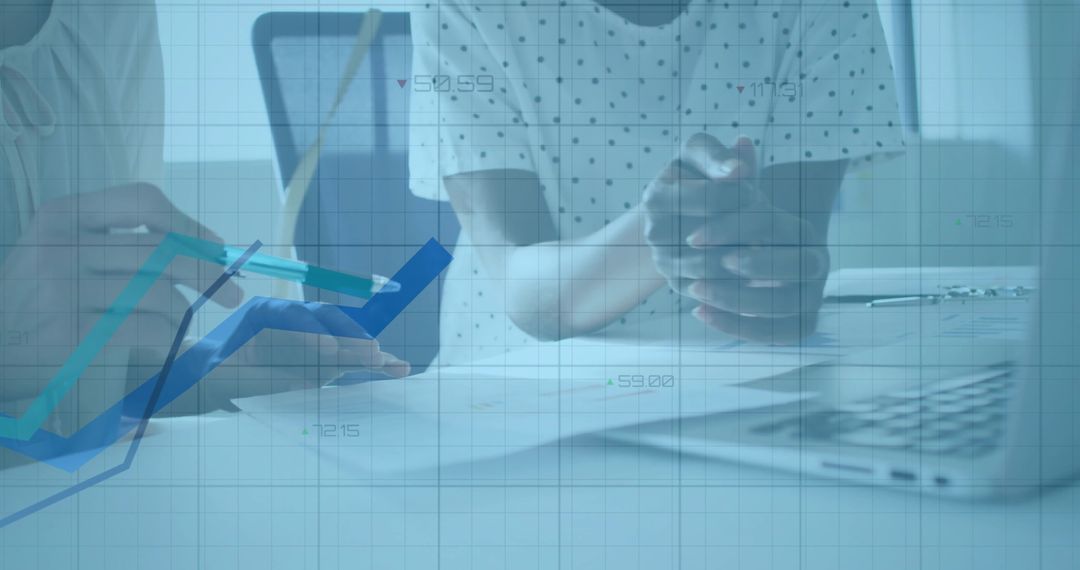 Consulting Doctor Analyzing Graphs with Patient in Clinic