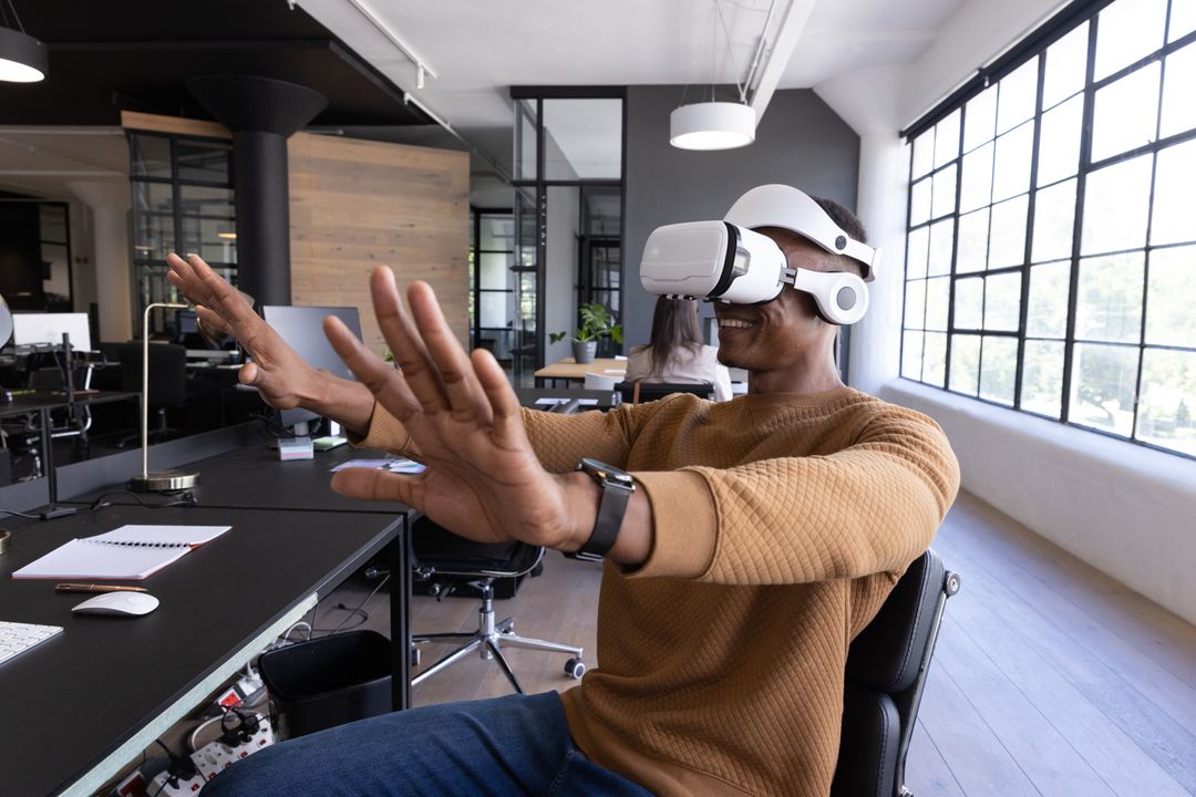 Male Professional Engaged with Virtual Reality in Modern Office Environment