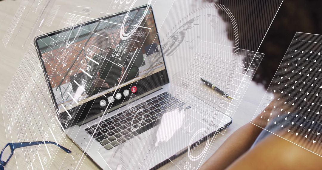 Modern Workspace Featuring Laptop with Virtual Conference Screen