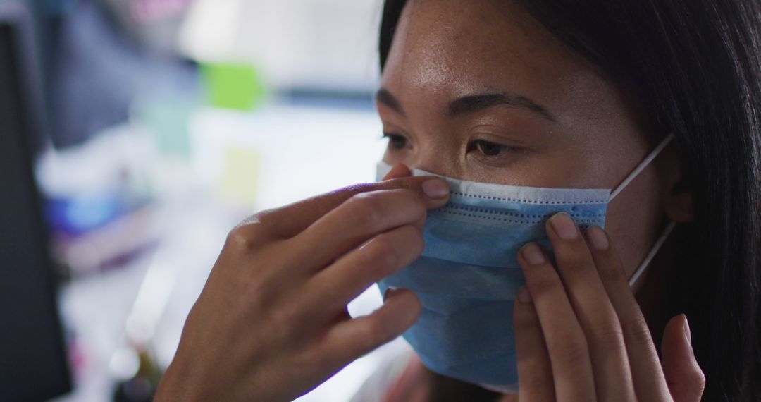 Woman Wearing Surgical Mask for Safety and Prevention - Free Images, Stock Photos and Pictures on Pikwizard.com