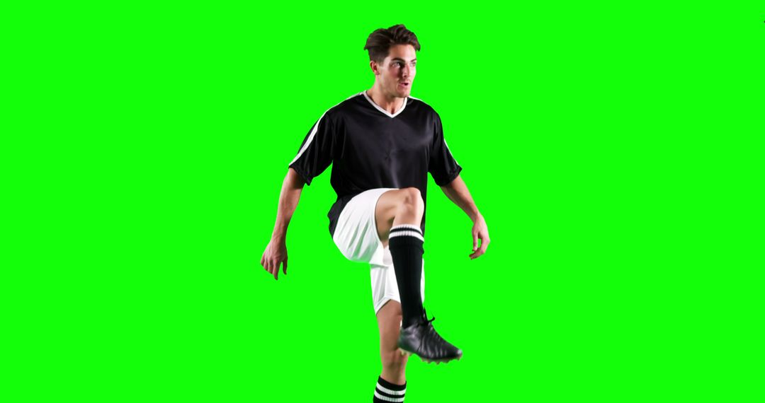 Soccer Player Practicing Dribbling on Green Screen - Free Images, Stock Photos and Pictures on Pikwizard.com