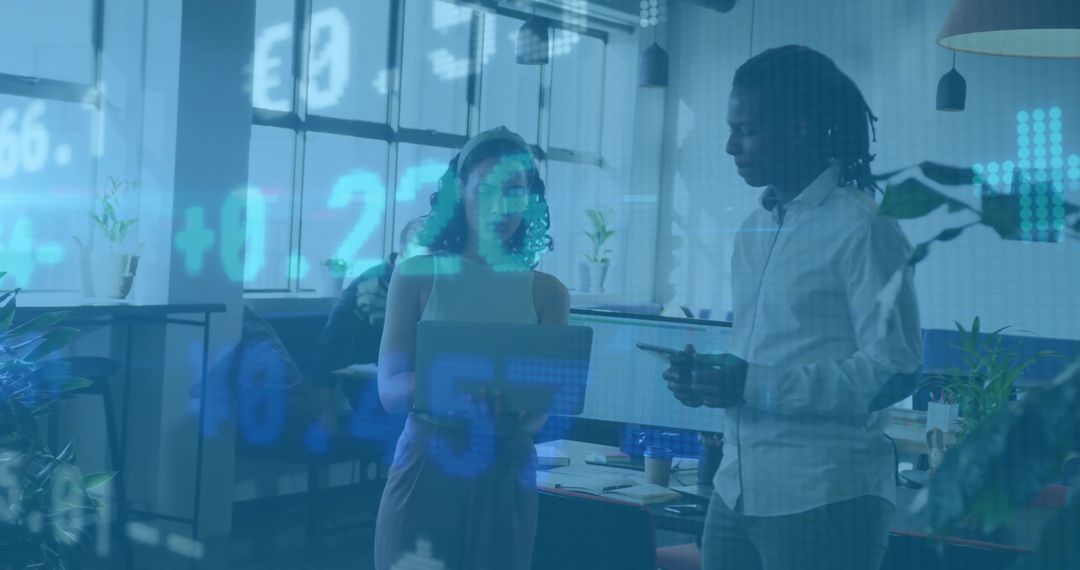 Collaborative Team Working on Financial Analysis in Modern Office